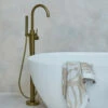 Britton Bathrooms Hoxton Floorstanding Bath Shower Mixer Tap - Brushed Brass -TAP WAREHOUSE Shop britton bathrooms hoxton brushed brass floorstanding bath shower mixer lifestyle 2