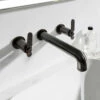 Crosswater Union 3 Hole Wall Mounted Basin Mixer Tap With Levers - Brushed Black Chrome 1 Crosswater Union 3 Hole Wall Mounted Basin Mixer Tap With Levers - Brushed Black Chrome -TAP WAREHOUSE Shop crosswater union brushed black chrome 3 hole wall mounted basin tap levers lifestyle