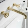 Crosswater Union 3 Hole Wall Mounted Basin Mixer Tap With Wheels - Brushed Brass 1 Crosswater Union 3 Hole Wall Mounted Basin Mixer Tap With Wheels - Brushed Brass -TAP WAREHOUSE Shop crosswater union brushed brass 3 hole wall mounted basin tap wheels lifestyle