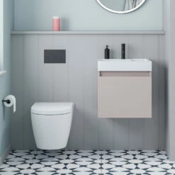 Minnie 500mm Wall Mounted 1 Door Vanity Unit & Polymarble Basin - Blush Pink -TAP WAREHOUSE Shop drench minnie blush pink standard cloakroom wallhung vanity unit lifestyle