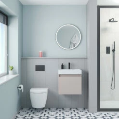 Minnie 500mm Wall Mounted 1 Door Vanity Unit & Polymarble Basin - Blush Pink -TAP WAREHOUSE Shop drench minnie blush pink standard cloakroom wallhung vanity unit lifestyle1