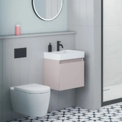 Minnie 500mm Wall Mounted 1 Door Vanity Unit & Polymarble Basin - Blush Pink -TAP WAREHOUSE Shop drench minnie blush pink standard cloakroom wallhung vanity unit lifestyle2