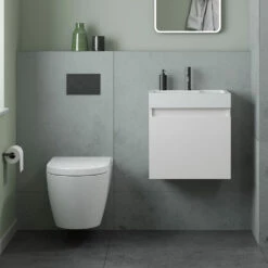 Minnie 500mm Wall Mounted 1 Door Vanity Unit & Polymarble Basin - Gloss White -TAP WAREHOUSE Shop drench minnie gloss white standard cloakroom wallhung vanity unit lifestyle
