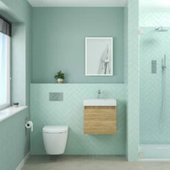 Minnie 500mm Wall Mounted 1 Door Vanity Unit & Polymarble Basin - Natural Oak -TAP WAREHOUSE Shop drench minnie natural oak standard cloakroom wallhung vanity unit lifestyle1