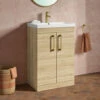 Emily 600mm Natural Oak Floorstanding 2 Door Vanity Unit, Thin-Edged Basin, Brushed Brass Handles & Overflow -TAP WAREHOUSE Shop emily oak 600 2door floor brass handles lifestyle