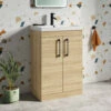 Emily 600mm Natural Oak Floorstanding 2 Door Vanity Unit, Thin-Edged Basin, Matt Black Handles & Overflow 1 Emily 600mm Natural Oak Floorstanding 2 Door Vanity Unit, Thin-Edged Basin, Matt Black Handles & Overflow -TAP WAREHOUSE Shop emily oak 600 floor unit black handles lifestyle
