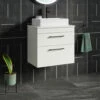 Emily 500mm Gloss White Wall Mounted 2 Drawer Vanity Unit And Countertop With Matt Black Handles -TAP WAREHOUSE Shop emily white 2draw 600 counter wall black lifestyle