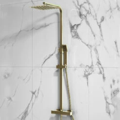 Drench Brushed Brass Square Thermostatic Rigid Riser Shower Kit 18 Drench Brushed Brass Square Thermostatic Rigid Riser Shower Kit -TAP WAREHOUSE Shop harbour square rigid riser shower kit brass lifestyle1