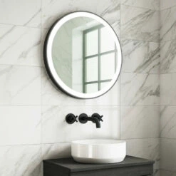 Harbour Status LED Illuminated Black Frame Round Mirror With Demister Pad & Colour Change LEDs - 800mm 13 Harbour Status LED Illuminated Black Frame Round Mirror With Demister Pad & Colour Change LEDs - 800mm -TAP WAREHOUSE Shop harbour status led black frame round mirror 600mm bright lifestyle
