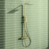 Harbour Status Brushed Brass Square Thermostatic Rigid Riser Shower Kit 1 Harbour Status Brushed Brass Square Thermostatic Rigid Riser Shower Kit -TAP WAREHOUSE Shop harbour status rigid riser thermostatic shower kit brushed brass lifestyle