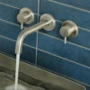 Inox Brushed Stainless Steel Wall Mounted Basin Mixer 1 Inox Brushed Stainless Steel Wall Mounted Basin Mixer -TAP WAREHOUSE Shop inox 3 hole wall basin mixer stainless steel lifestyle3