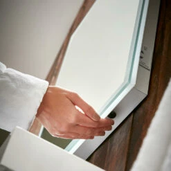 Harbour Glow LED Bluetooth Mirror With Demister Pad & Shaver Socket - 500 X 700mm 12 Harbour Glow LED Bluetooth Mirror With Demister Pad & Shaver Socket - 500 X 700mm -TAP WAREHOUSE Shop mirror sensor detail