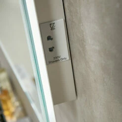 Harbour Glow LED Bluetooth Mirror With Demister Pad & Shaver Socket - 500 X 700mm 13 Harbour Glow LED Bluetooth Mirror With Demister Pad & Shaver Socket - 500 X 700mm -TAP WAREHOUSE Shop mirror socket detail