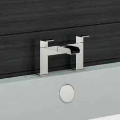 Vellamo Reve Waterfall Basin Mixer & Waterfall Bath Filler Value Pack -TAP WAREHOUSE Shop primary vellamo reve deck mounted waterfall bath filler tap lifestyle2 1