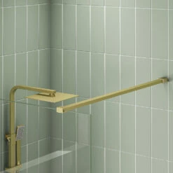 Harbour I8 760 8mm 2m Tall Easy Clean Wetroom Panel - Brushed Brass 7 Harbour I8 760 8mm 2m Tall Easy Clean Wetroom Panel - Brushed Brass -TAP WAREHOUSE Shop scudo brushed brass single walkin wetroom panel supportarm detail lifestyle