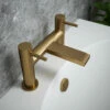 The Tap Factory Vibrance Brushed Brass Deck Mounted Bath Filler With Chrome Handles 1 The Tap Factory Vibrance Brushed Brass Deck Mounted Bath Filler With Chrome Handles -TAP WAREHOUSE Shop tap factory brushed brass bath filler lifestyle