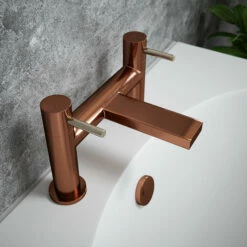 The Tap Factory Vibrance Polished Copper Deck Mounted Bath Filler With Vanto Black Handles 14 The Tap Factory Vibrance Polished Copper Deck Mounted Bath Filler With Vanto Black Handles -TAP WAREHOUSE Shop tap factory brushed copper bath filler nickel handles lifestyle