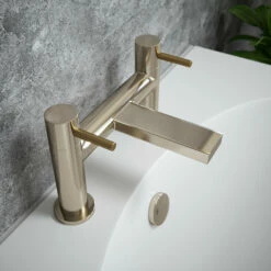 The Tap Factory Vibrance Brushed Nickel Deck Mounted Bath Filler With Brushed Brass Handles -TAP WAREHOUSE Shop tap factory brushed nickel bath filler brass handles lifestyle
