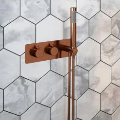 The Tap Factory Vibrance Copper WRAS Approved Concealed Thermostatic Shower Valve With Fixed Shower Head And Shower Handset 8 The Tap Factory Vibrance Copper WRAS Approved Concealed Thermostatic Shower Valve With Fixed Shower Head And Shower Handset -TAP WAREHOUSE Shop the tap factory vibrance shower valve and handset copper lifestyle