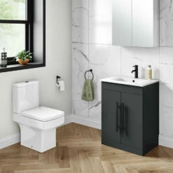 Vellamo Aspire 600mm Floorstanding 2 Door Vanity Unit & Ceramic Basin With Matt Black Handles & Overflow Cover - Matt Grey -TAP WAREHOUSE Shop vellamo aspire 2door 600mm matt grey vanity unit black handles lifestyle1