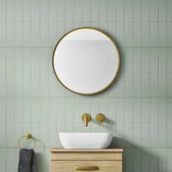 VOS Round Matt Black Framed Mirror - 600mm 15 VOS Round Matt Black Framed Mirror - 600mm -TAP WAREHOUSE Shop vos 600mm round framed mirror brushed brass lifestyle