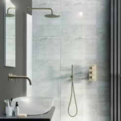 VOS Single Lever Wall Mounted Basin Mixer Tap - Brushed Brass -TAP WAREHOUSE Shop vos brushed brass shower set lifestyle 2
