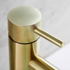 VOS Single Lever Basin Mixer With Designer Handle - Brushed Brass -TAP WAREHOUSE Shop vos mono basin mixer designer handle detail brushed brass lifestyle
